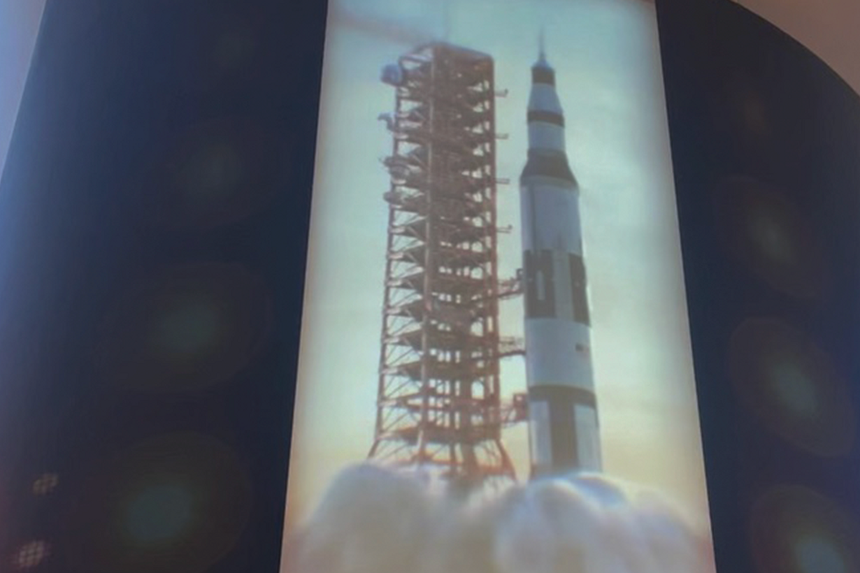 The rocket is activated and undergoes a simulated launch sequence, including a countdown, simulated smoke, and fire effects, based on the chosen donation tier.